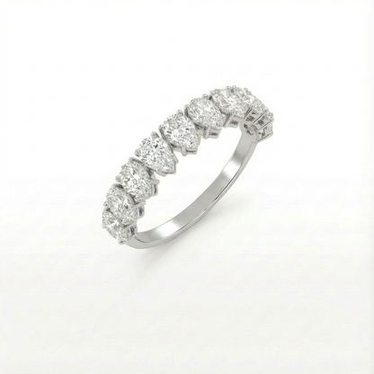 Pear half eternity ring