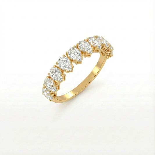 Pear half eternity ring