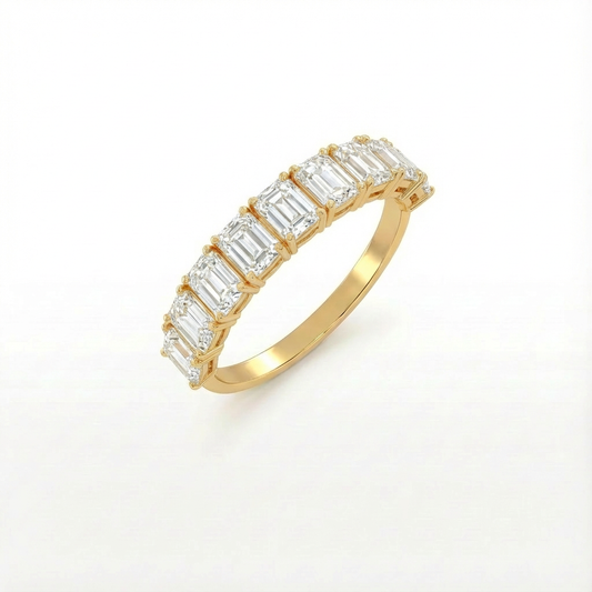 Emerald half eternity ring