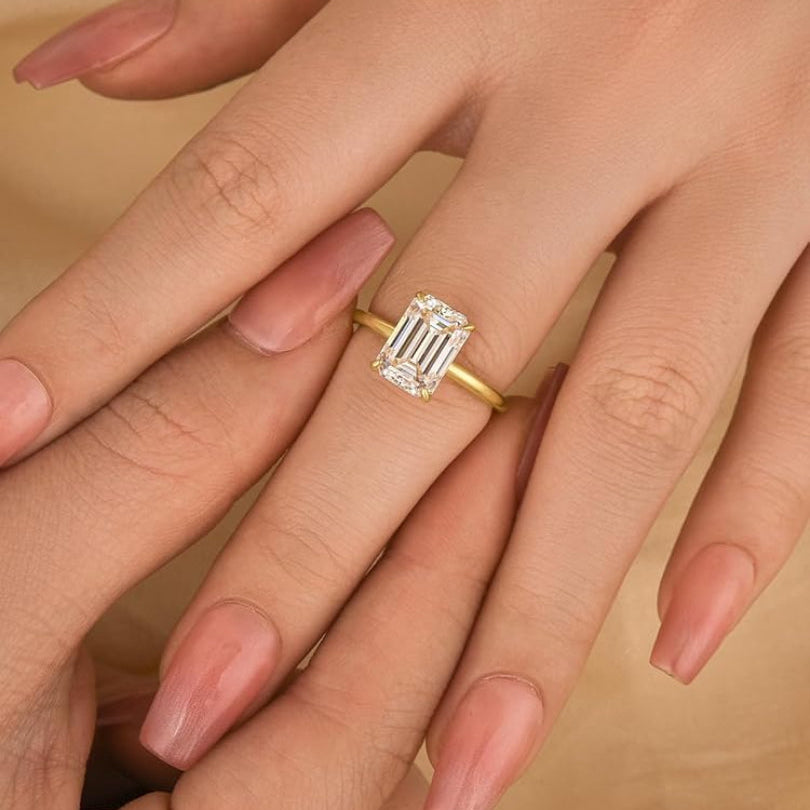 Emerald cut solitaire ring