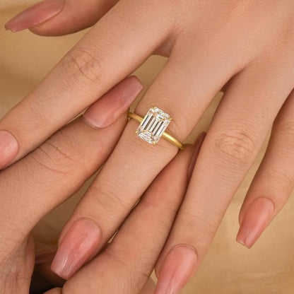 Emerald cut solitaire ring