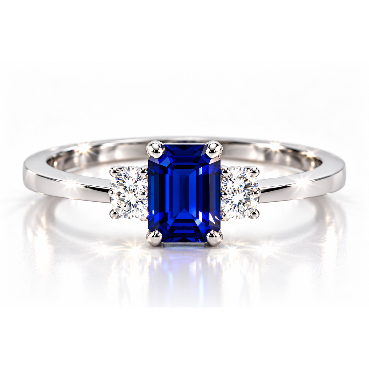 emerald cut sapphire three stone ring