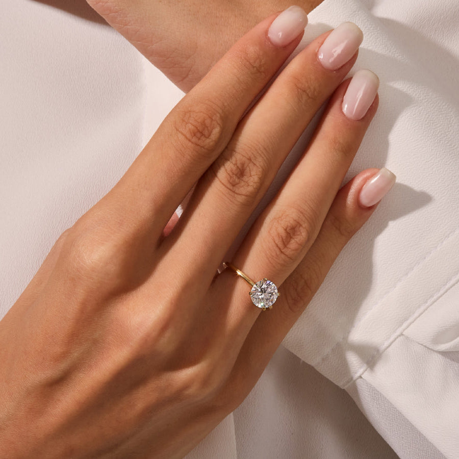 Round cut solitaire ring
