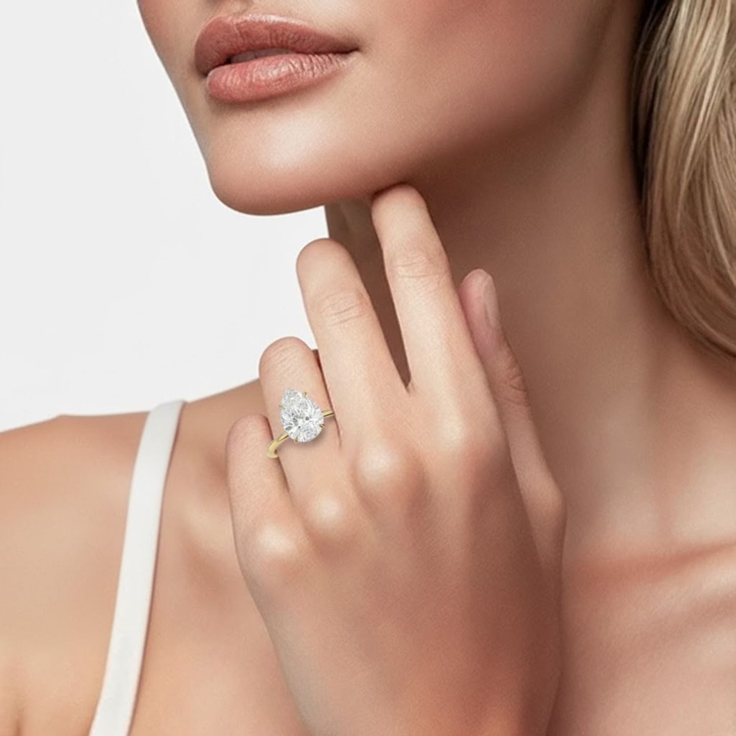 Pear cut solitaire ring