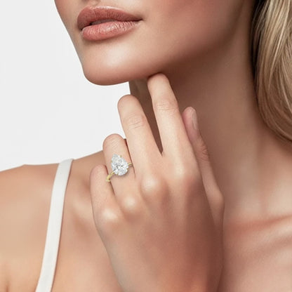 Pear cut solitaire ring