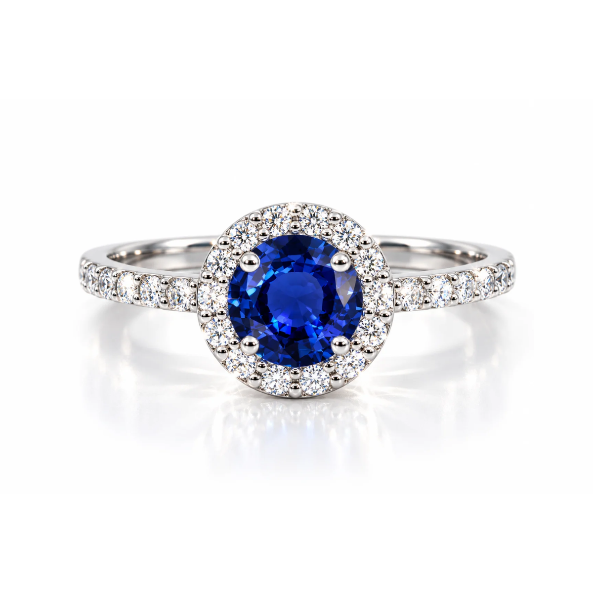 Round sapphire halo engagement ring with diamonds in 18k gold
