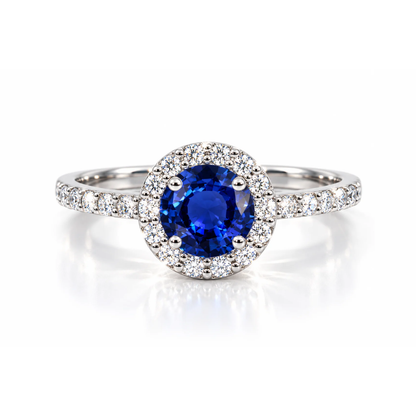 Round sapphire halo engagement ring with diamonds in 18k gold